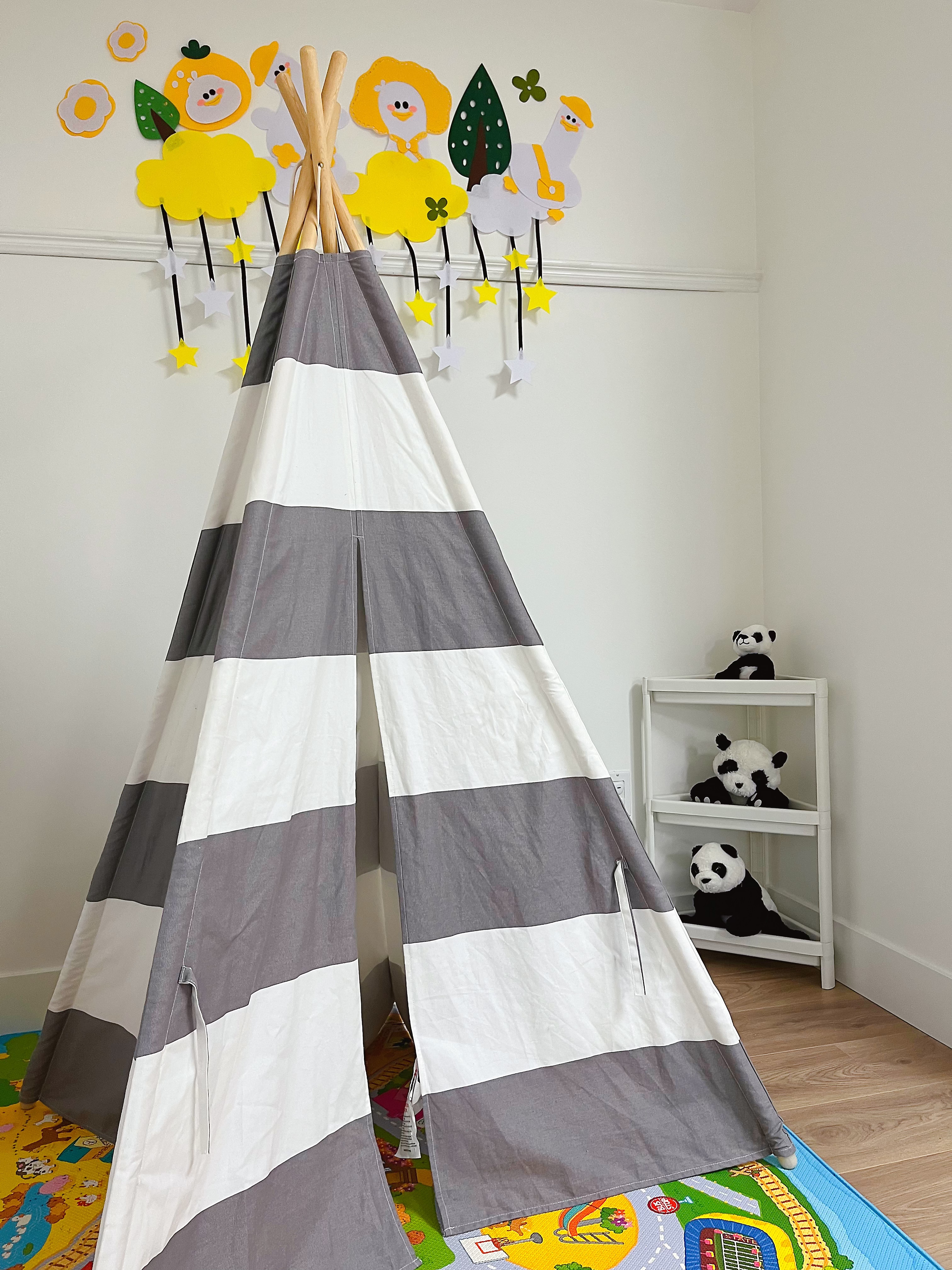 Children's play area with tent